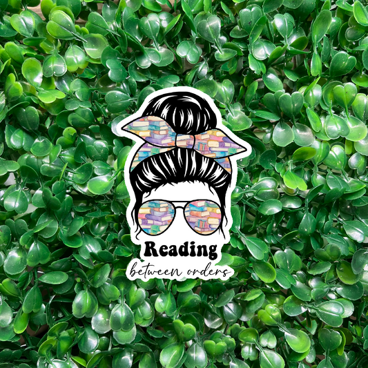 Reading Between Orders Sticker